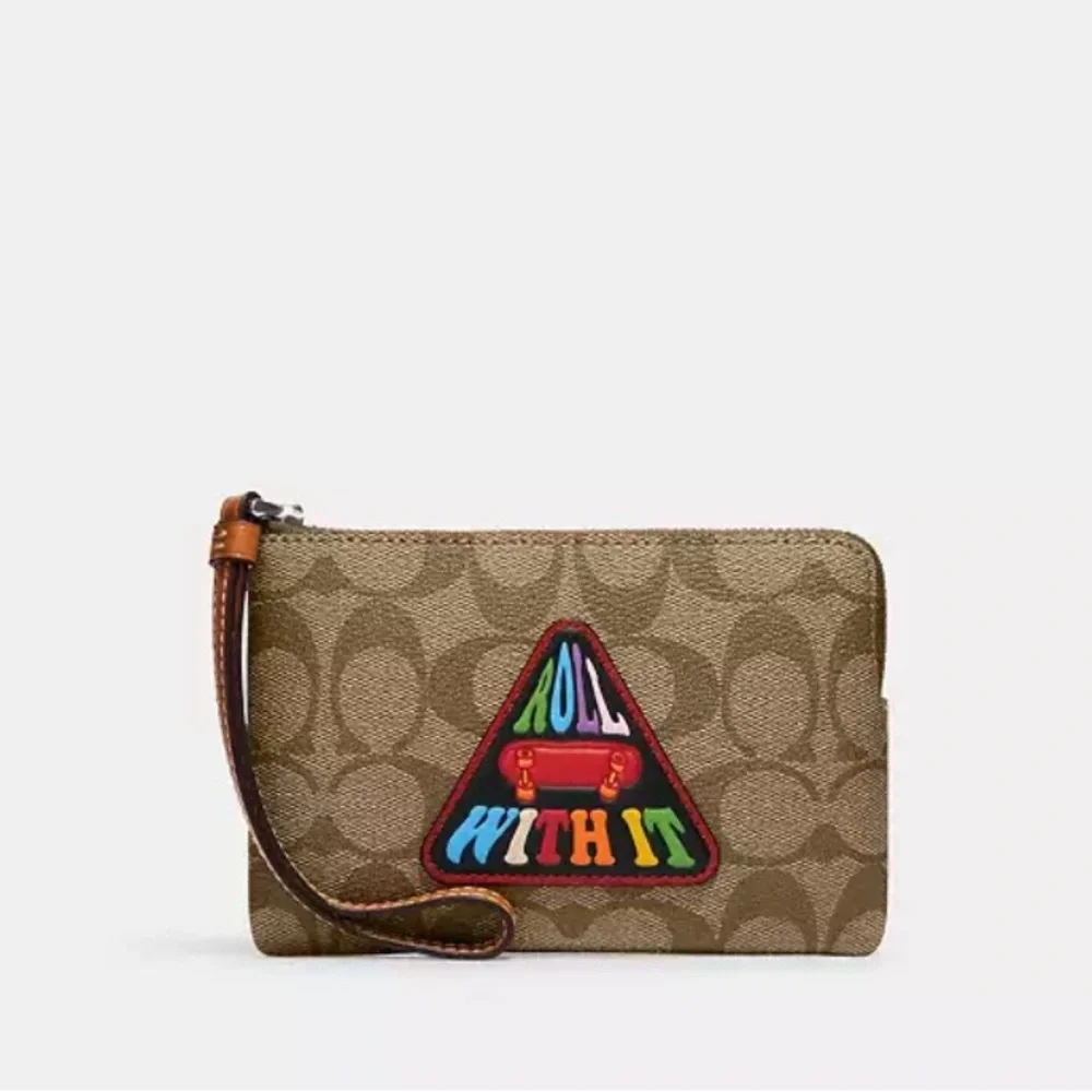 Corner zip wristlet with patches 2023 pride collection
